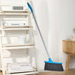 Long-handle floor scrub brush with stiff bristles for cleaning showers and tiles.