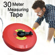 Measuring tape in use with extended and retracted sections