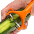 Kitchen peeler with comfortable grip for easy peeling of produce.