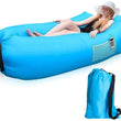 Inflatable lounger sofa in use at a campsite