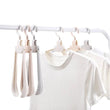 Multi-layer stainless steel pants hanger, 6-in-1, folding storage rack for trousers and accessories.