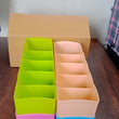 Set of 4 storage organizers with 5 compartments each for socks and handkerchiefs.