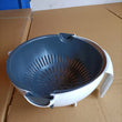 Kitchen bowl and strainer with handle for washing and draining produce.