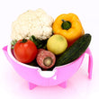 Multi-functional vegetable shredder with built-in drain basket.