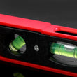 Compact spirit level with three bubbles for accurate measurement.