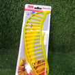 Plastic banana slicer with handle, for cutting fruit into slices for salads.