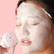 Silicone face scrubber in cute octopus shape, ideal for facial cleansing.