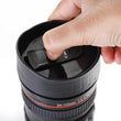 Coffee mug designed as a camera lens, with a secure lid