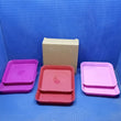 Various colors of square plastic plates.