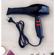 Professional hair dryer with sleek design and heat control.