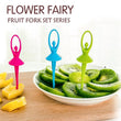 Fruit fork cutlery set with a playful dancing doll stand