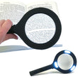 Magnifying glass featuring LED lights and rubberized grip.