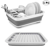 Collapsible silicone dish drying rack with utensil holder.