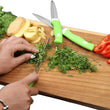 Elegant stainless steel knife and peeler set for home use.