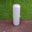 Travel storage bottle, capsule shape, with detailed texture