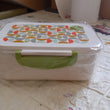 Lunch box with 3 sections, leak-proof, and spoon for convenient use