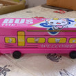 Bus-shaped pencil case with movable wheels, double decker.