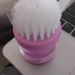 Multicolour plastic wash basin brush cleaner with soap dispenser.