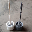 Potted holder with toilet brush, side view