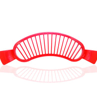 Plastic banana slicer with handle for easy slicing.