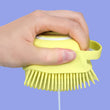 Silicone body brush with built-in shampoo dispenser for massage and bathing.