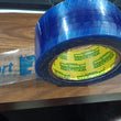 Blue tape for packaging with Flipkart logo for delivery use.