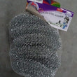 Stainless steel scrubbers for cleaning pots, pans, and dishes. Pack of 6 durable scourers.