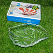 Leaf-shaped glass tray with snacks