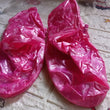 Pink and transparent shoe covers for kids and adults in rain and snow