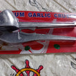 Garlic press with ergonomic design for easy handling