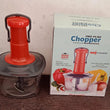 Manual food chopper with locking feature and stainless steel blades