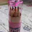 Kids art supplies with colored pencils and sharpener