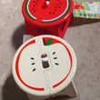 Kids' foldable stool with vibrant fruit patterns, ideal for small spaces