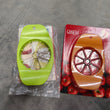 Ganesh apple cutter, plastic and stainless steel, various colors.