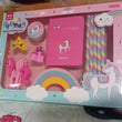 Unicorn-themed stationery with diary and pencils, ideal for young girls' birthdays.